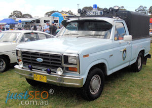 Ford F100 Police cage truck